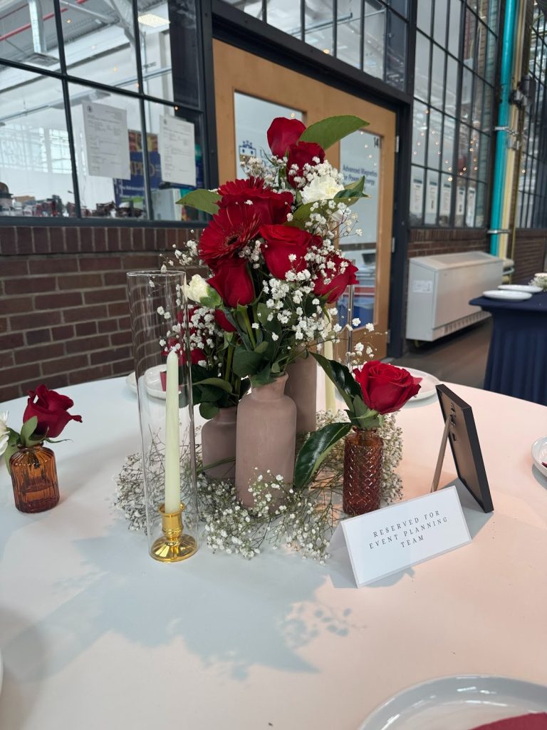 fresh floral arrangements inside pottery inspired by Algerian vessels.