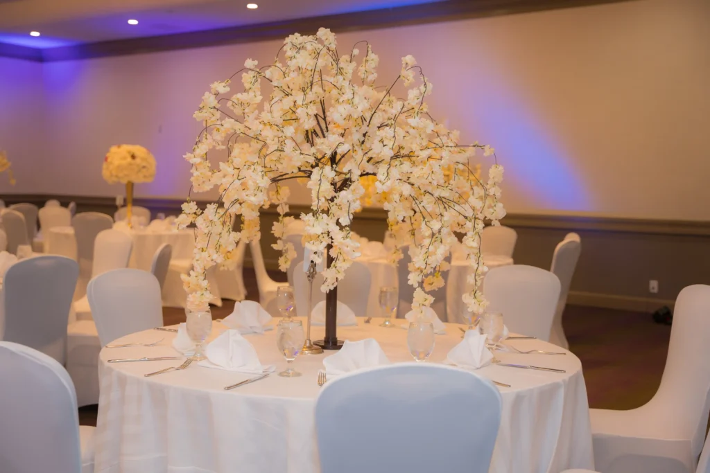 cherry blossom tree centerpiece white round tables
