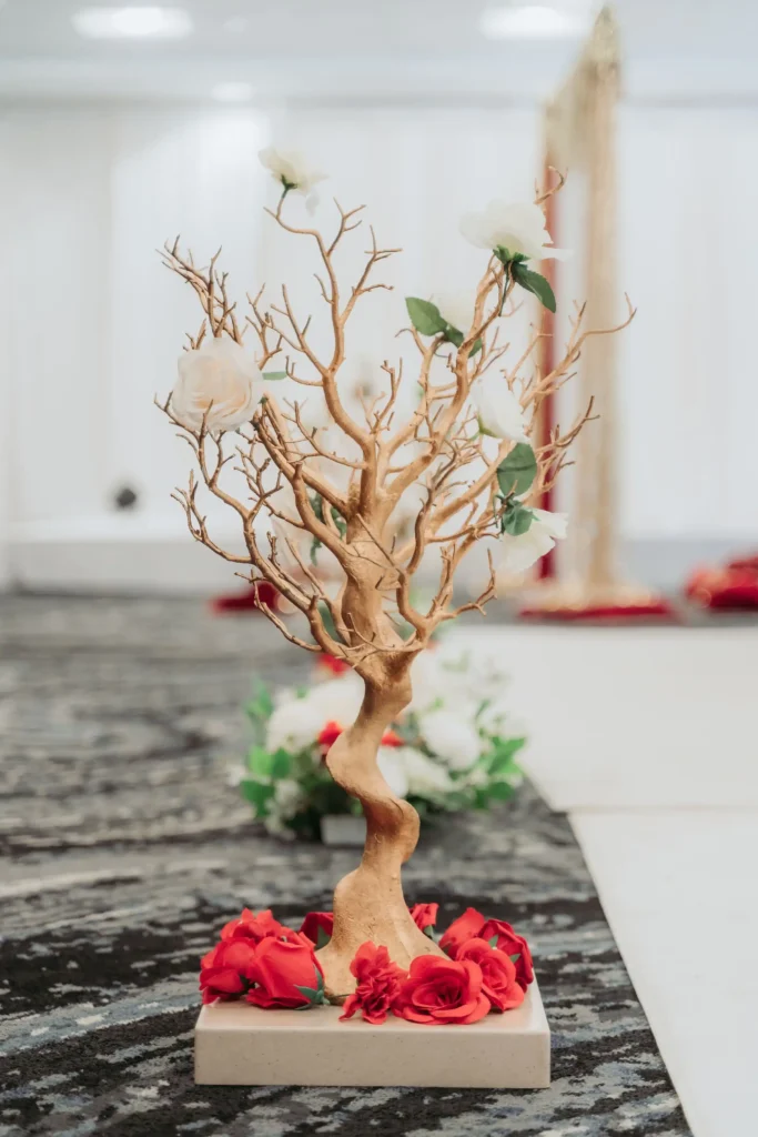 gold manzanita tree centerpiece red white roses