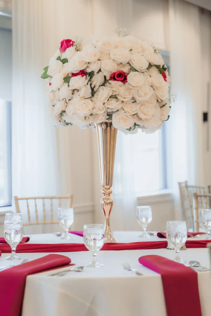 ivory rose ball gold pedestal vase pink napkins daylight