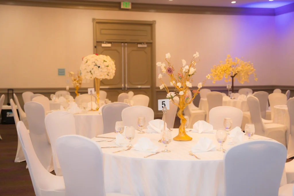 mixed centerpieces gold manzanita rose ball white ballroom