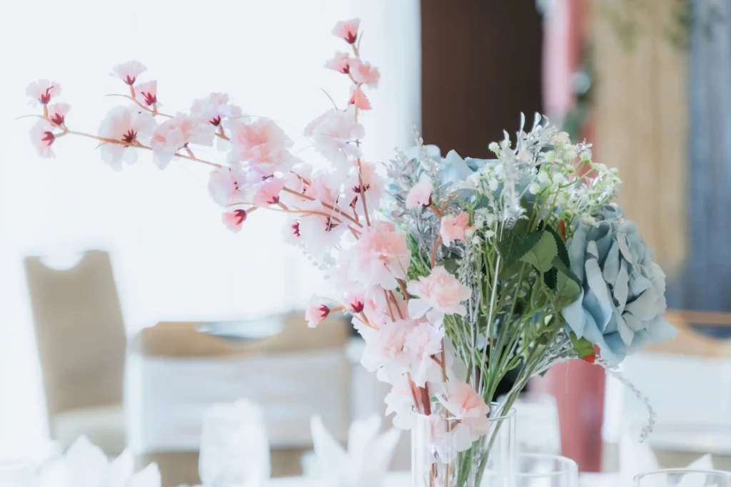 pink cherry blossom blue hydrangea floral centerpiece