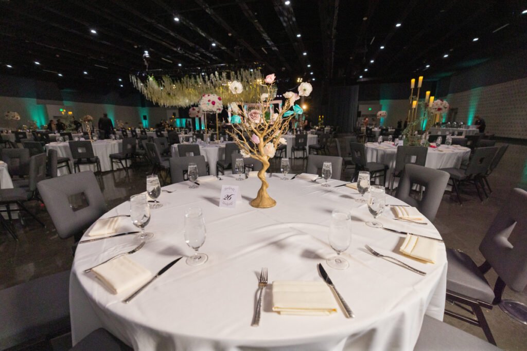 Gold tree wedding centerpiece Pittsburgh — luxury reception tablescape with colorful florals