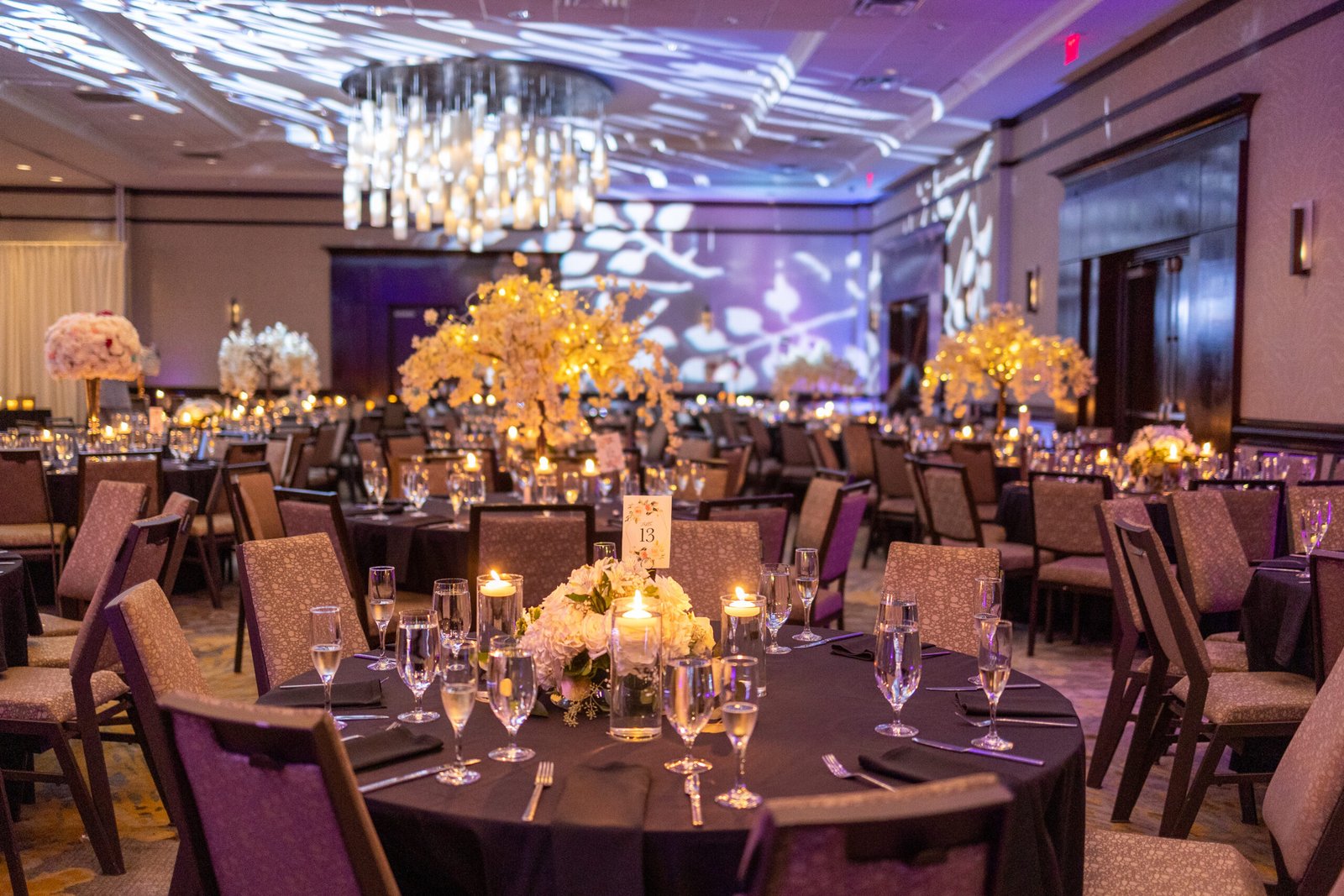 Low lush floral wedding centerpieces at The Westin Mount Laurel reception by Regal Event Decor