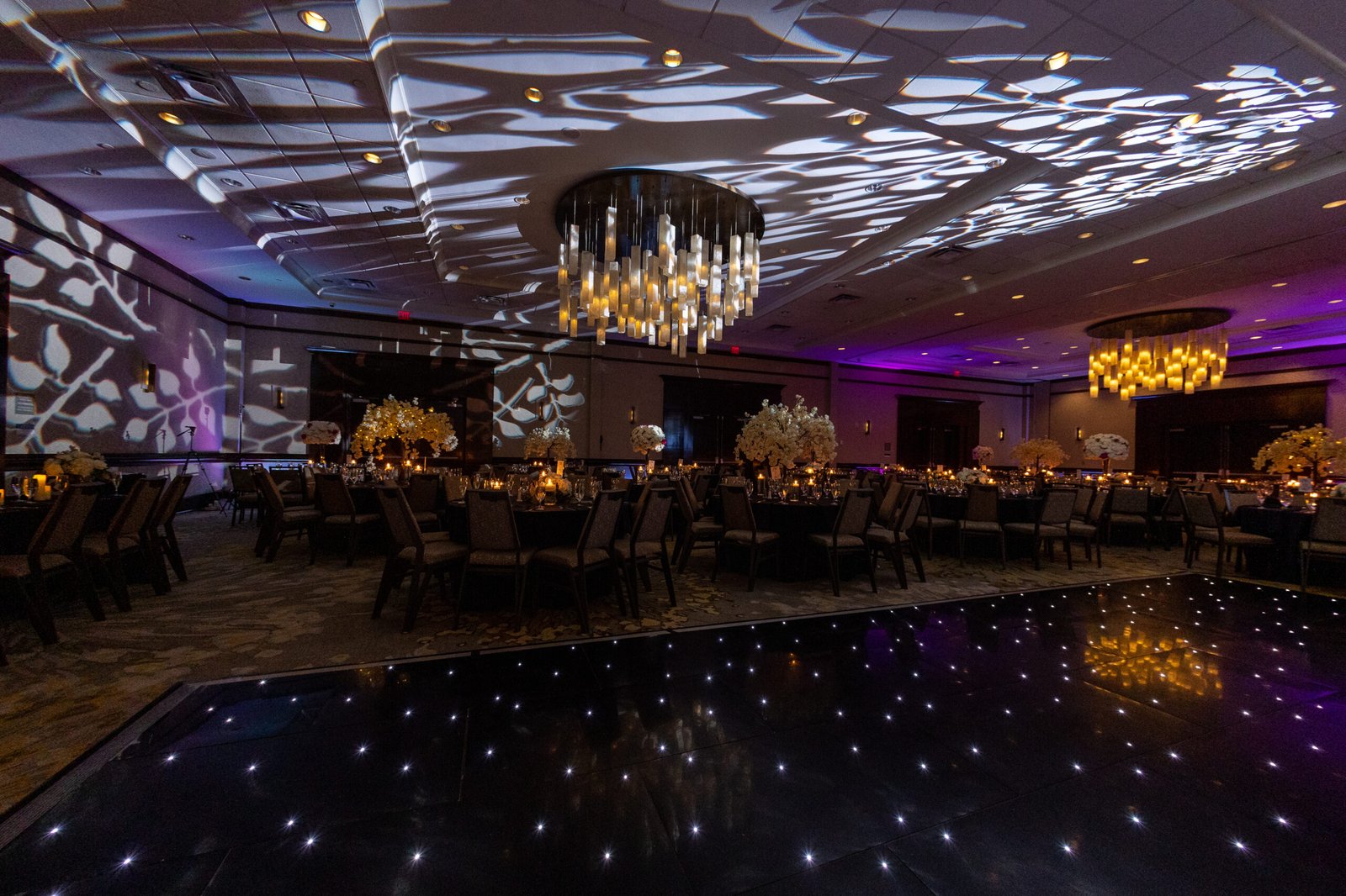 Tall gold wedding centerpieces at The Westin Mount Laurel reception by Regal Event Decor — architectural florals, luxury wedding decor