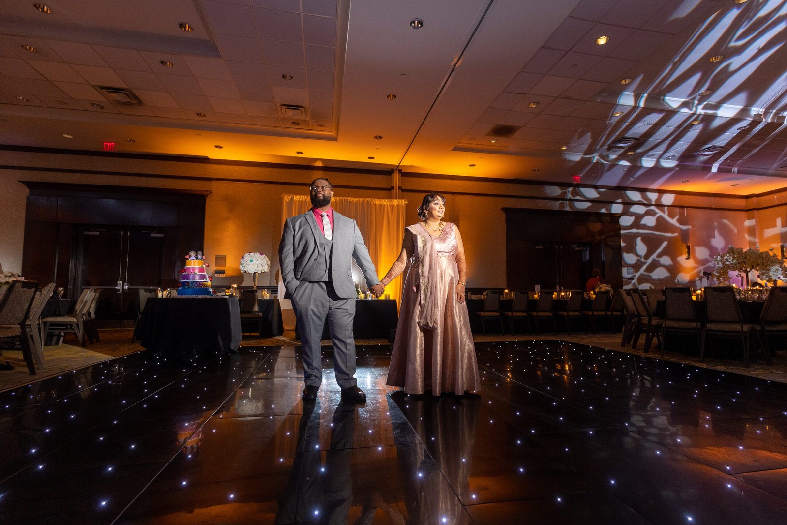 Wedding couple entrance at The Westin Mount Laurel reception, decor by Regal Event Decor