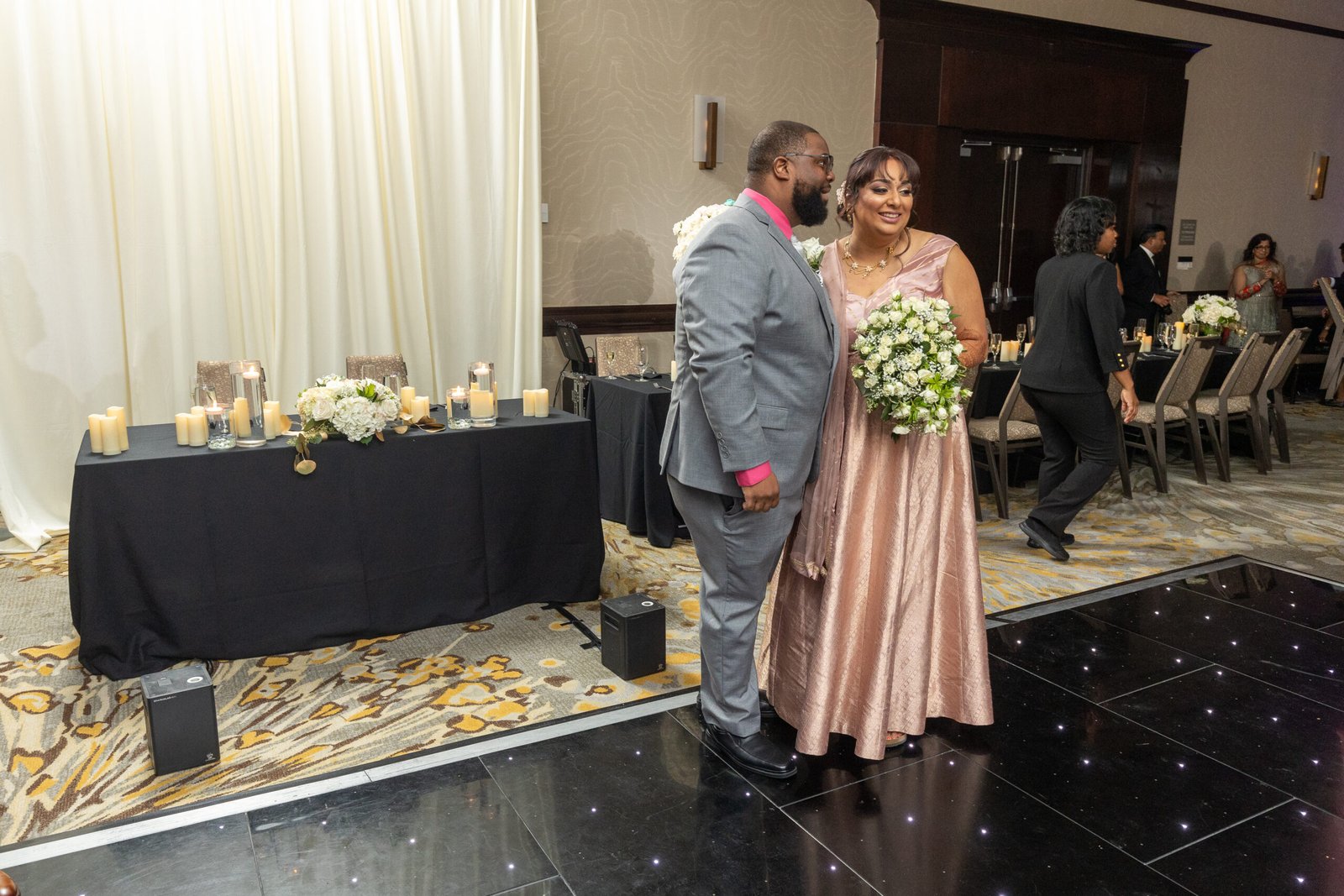 Sweetheart table at The Westin Mount Laurel wedding reception by Regal Event Decor — candles and florals